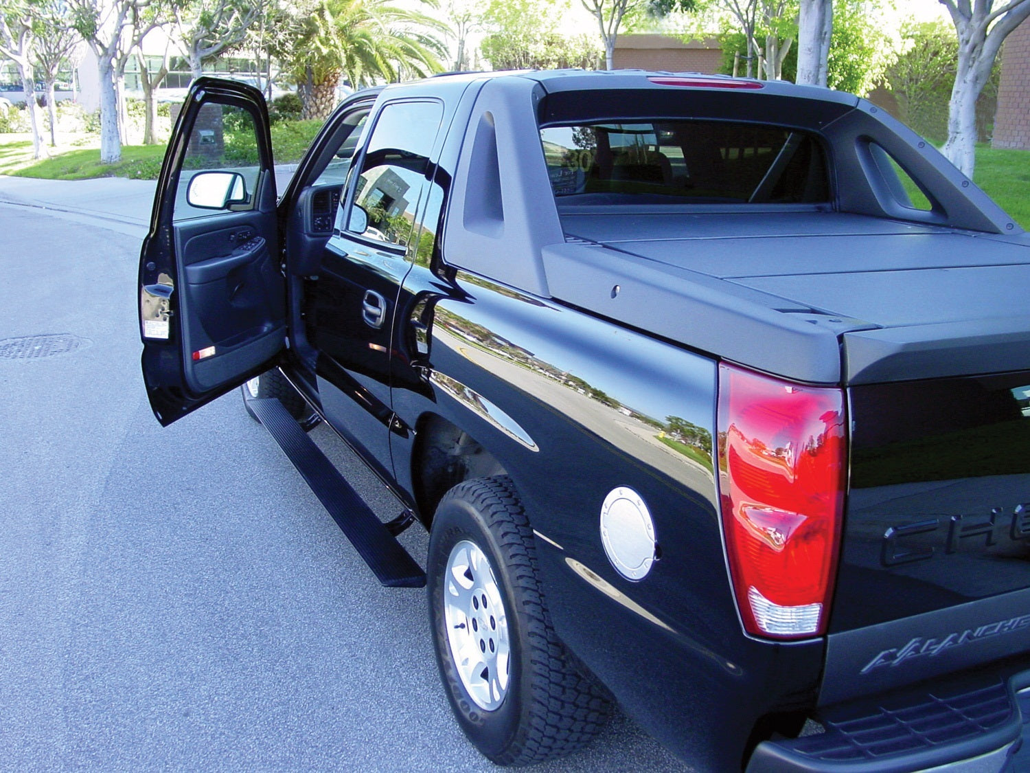 AMP Research 75125-01A PowerStep™; Incl. OEM Style Illumination; Black; AMP Research 75125-01A