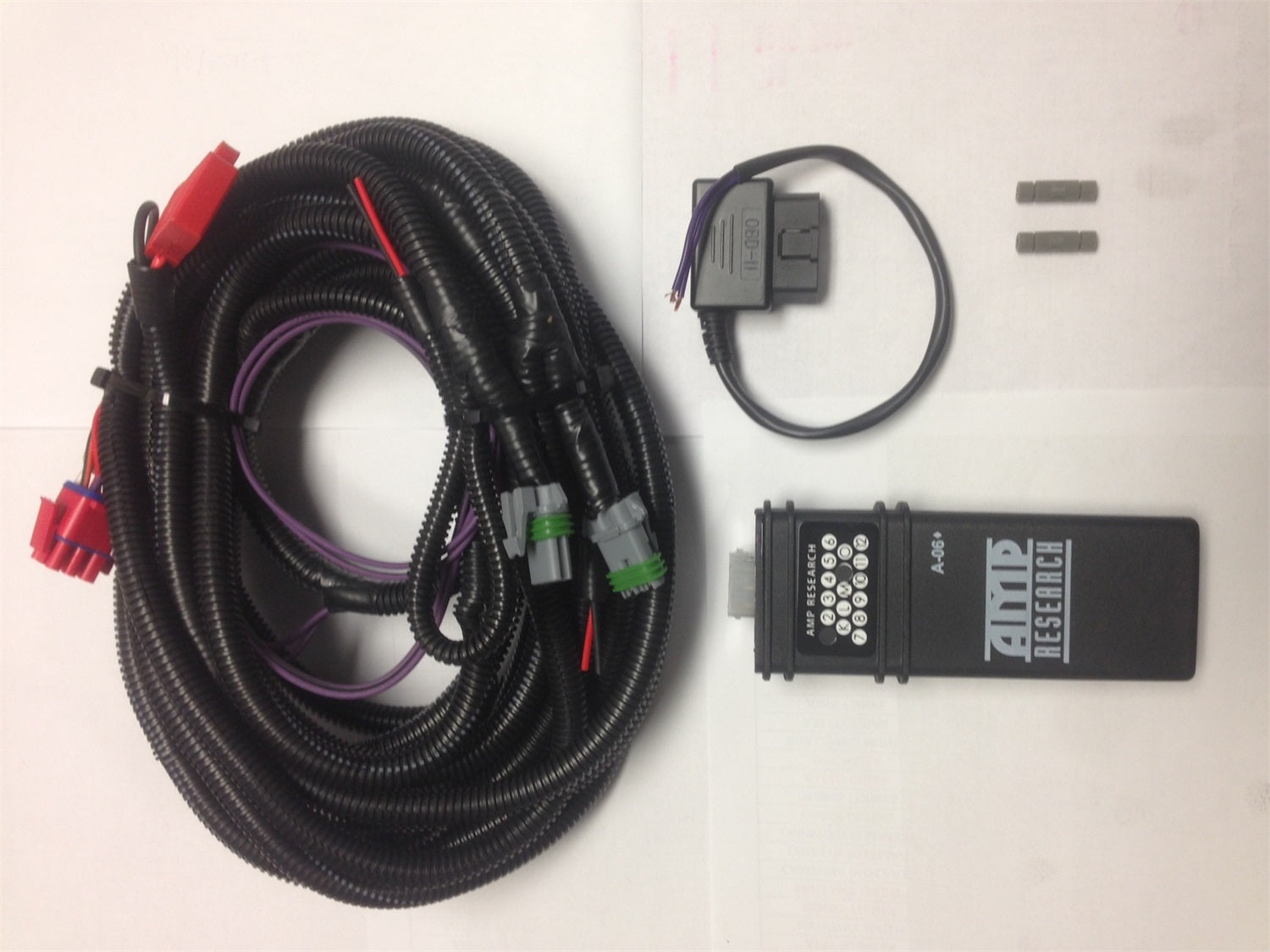 AMP Research 76401-01A PowerStep™ Plug And Play Conversion Kit; Black; AMP Research 76401-01A