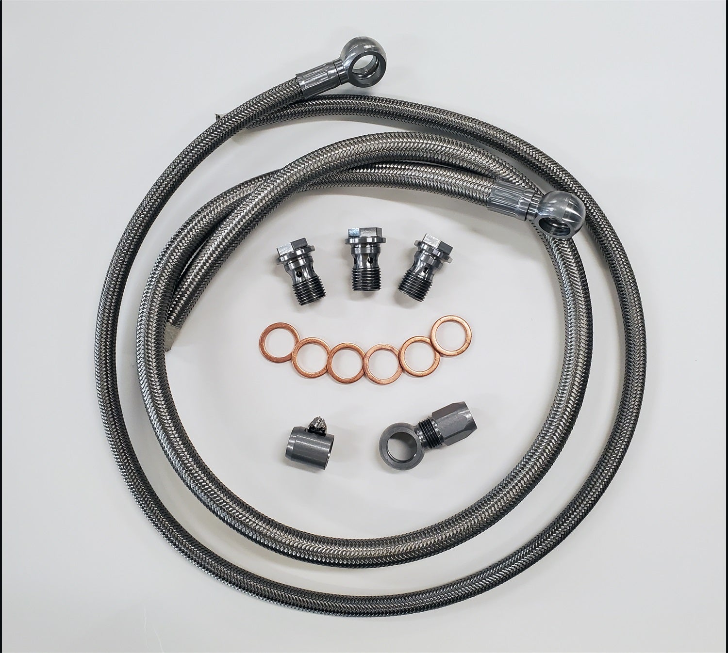Borgeson 925130 Stainless Steel Power Steering Hose kit; 2 pc. Banjo Fittings; Crimped one end. Borgeson 925130