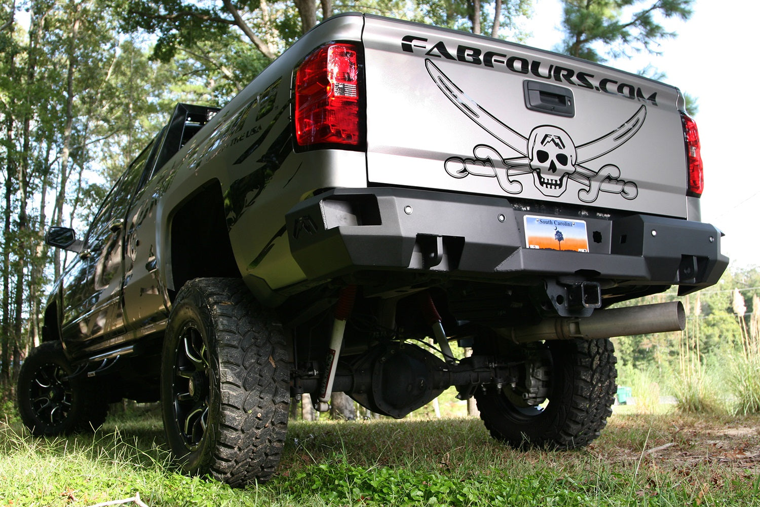 Fab Fours CH14-W3051-B Premium Rear Bumper; Uncoated/Paintable; w/Sensors; [AWSL]; Fab Fours CH14-W3051-B