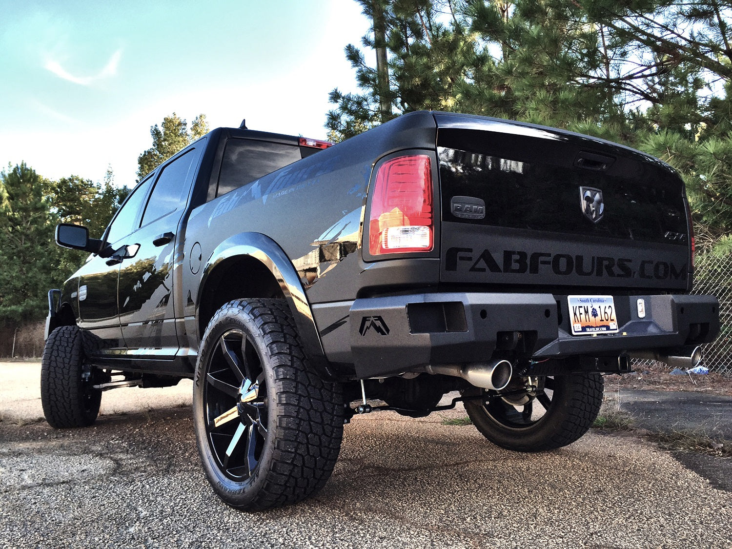 Fab Fours DR09-W2952-B Heavy Duty Rear Bumper; Uncoated/Paintable; w/Sensors; [AWSL]; Fab Fours DR09-W2952-B