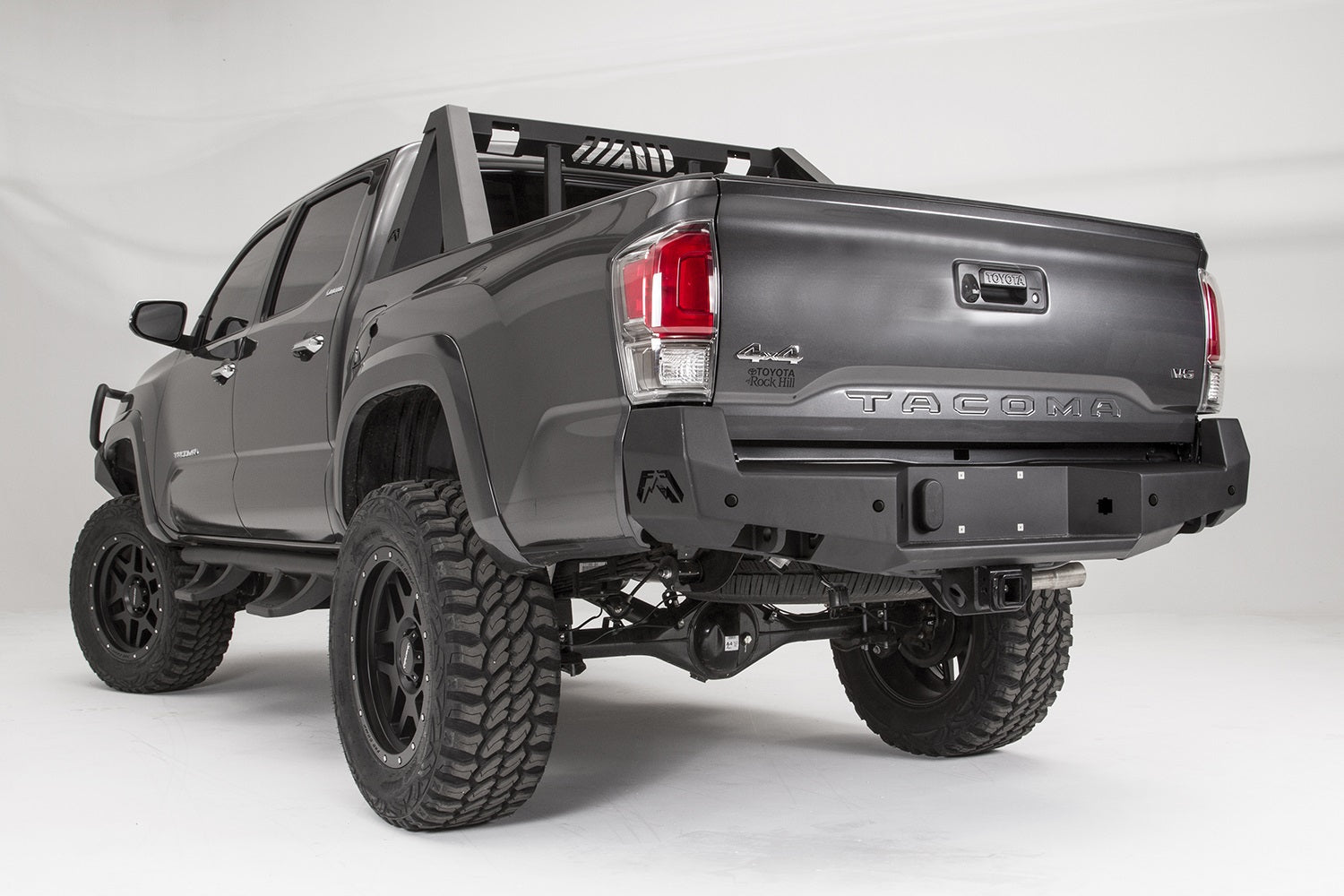 Fab Fours TT16-W3651-B Premium Rear Bumper; Uncoated/Paintable; [AWSL]; Fab Fours TT16-W3651-B