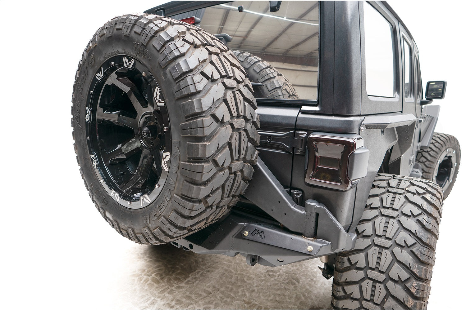 Fab Fours JL18-Y1851T-B Off The Door Tire Carrier; Bare Steel; Fab Fours JL18-Y1851T-B