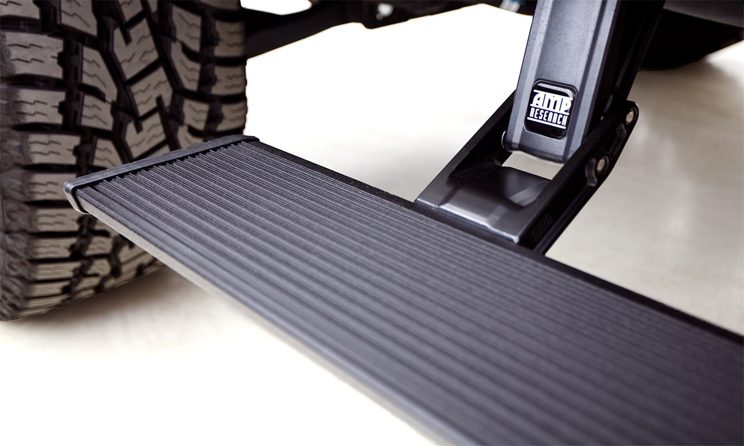 AMP Research 77255-01A PowerStep™ XL; Incl. OEM Style Illumination; Black; AMP Research 77255-01A